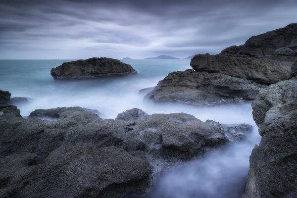 Long exposure on a cloudy day on the Tellaro cliff, municipality of Lerici, La Spezia province, Liguria district, Italy, Europe