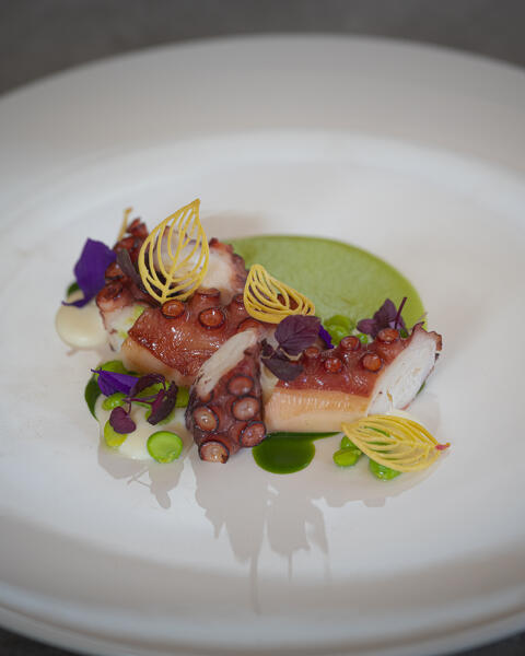 Bbq octopus, peas, crescenza and wild garlic