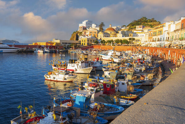 Sunset over the iconic mediterranean village of Ponza with colourful houses and boats overlooking the harbour, Ponza island, Archipelago Pontino, Latina province, Latium, Italy