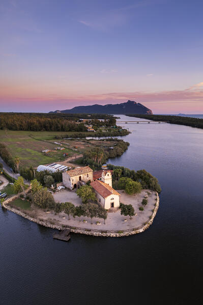 Panoramic aerial view of Sabaudia's lake and Madonna della Sorresca at dusk, Sabaudia, Circeo National Park, Latina province, Latium, Central Italy, Italy, Europe