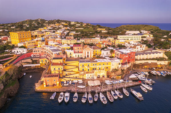 Aerial view of the roman harbour of Ventotene and the colourful houses on the marina at dawn, Ventotene Islands, Pontine Islands Archipelago, Tyrrhenian Sea, Latina province, Latium, Italy, Europe