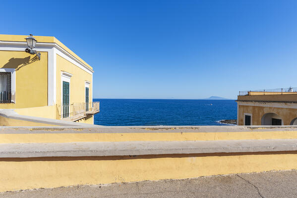 View from the street of the colourful village of Ventotene at sunshine, Ventotene island, Pontine islands, Tyrrhenian sea, Mediterranean sea, Latium, central Italy, Italy, Southern Europe, Europe.