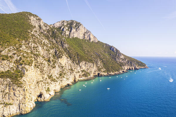 Aerial view of the coastline and the peaks of Circeo mountain with boats moored in the waters, Circeo National Park, Tyrrhenian sea, Mediterranean sea, Latina province, Latium, Central Italy, Italy, Southern Europe, Europe