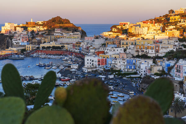 Sunset above the typical village of Ponza with the busy marina, Ponza island, Pontine islands, Tyrrhenian Sea, Latina province, Latium, Italy, Europe