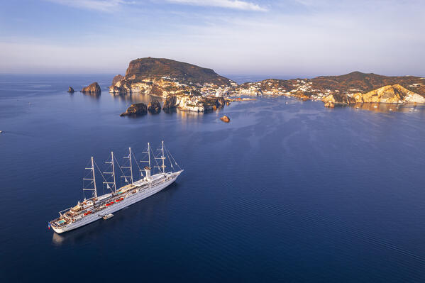 Drone view of a luxury sail boat anchored off the island of Ponza at sunrise, Ponza island, Pontine islands, Tyrrhenian Sea, Latina province, Latium, Italy, Europe 