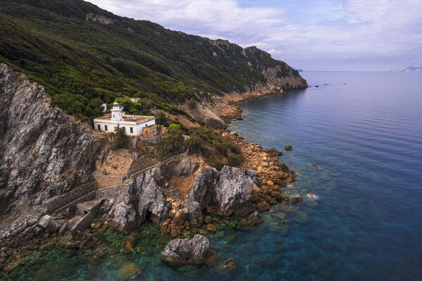 Aerial view of the white lighthouse of Capo Negro on the wild rocky island of Zannone, Ponza municipality, Pontine islands, Tyrrhenian Sea, Circeo National Park, Latina province, Latium, Italy