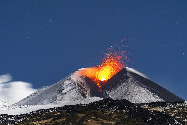 Night view of the strombolian activity from the South-East crater of the Mount Etna covered with snow, Piano Vetore, Regalna, Catania province, UNESCO World heritage Site, Sicily, Mediterranean Sea, Southern Italy, Italy, Southern Europe, Europe