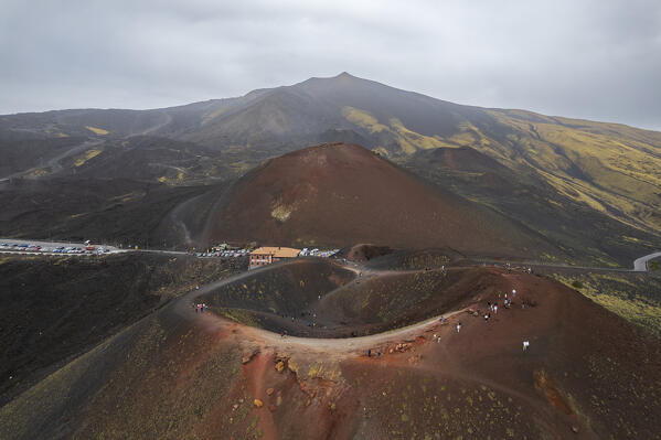 Aerial view of Silvestri craters with Etna volcano in the background, UNESCO word heritage site, Rifugio Sapienza, Etna Sud, Nicolosi, Catania province, Sicily, South of Italy, Italy, Europe
