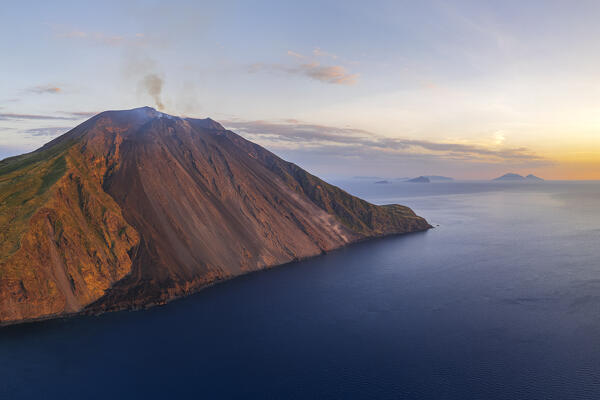 Aerial shot of Stromboli vocano seen at sunset with the so called 