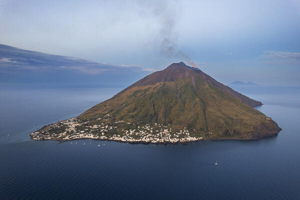Eruption of Stromboli volcano seen from the drone at dusk, Stromboli island, UNESCO World Heritage Site, Aeolian Islands, Sicily, Tyrrhenian Sea, Mediterranean Sea, South of Italy, Italy, Southern Europe, Europe