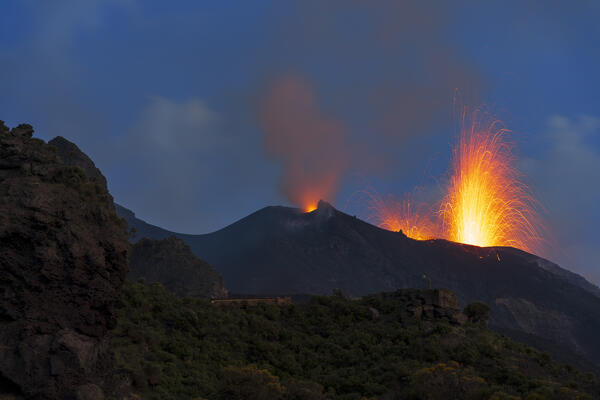Lava fountains during the volcanic eruption seen from below at dusk, Stromboli island, UNESCO World Heritage Site, Aeolian Islands, Sicily, Tyrrhenian Sea, Mediterranean Sea, South of Italy, Italy, Southern Europe, Europe