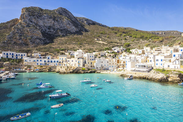 Fishing village of Levanzo and the small harbour with crystalline sea, Levanzo island, Favignana municipality, Trapani, Aegadian islands, Mediterranean Sea, Sicily, Italy