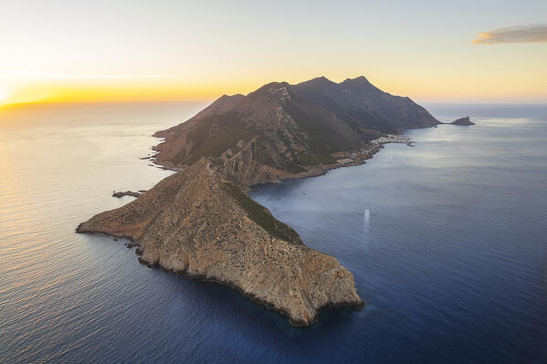 Aerial view of the rugged peaks of Marettimo island surrounded by sea at sunset, Marettimo, Favignana municipality, Trapani, Aegadian islands, Mediterranean Sea, Sicily, Italy