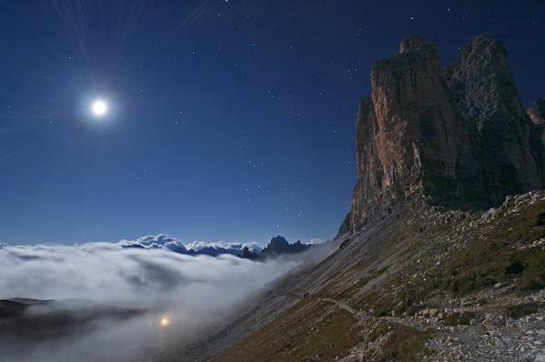 Italy, South Tyrol, Bolzano district - Drei Zinnen and full moon