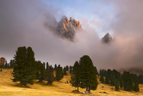 Italy, South Tyrol, Bolzano district, Funes Valley - Odle between low clouds