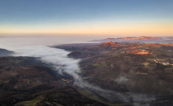 Panoramic aerial view of Alessandria hills with fog, Alessandria province, Piedmont, Italy, Europe. 