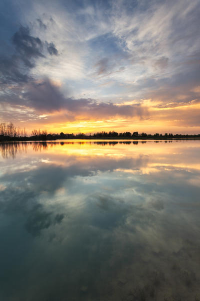 Lake Le Folaghe at sunset, Po Valley, Lombardy, Pavia province, Italy, Europe. 