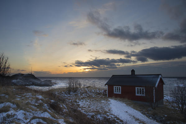 Norvegian rorbu at the dawn in the winter season, Lofoten islands.