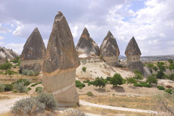 Fairy chimneys in the Kappadokia region in Turkey. They are created from ten millions of year old in the Pliocene with the last changes in the Holocene. They are create by tuff, sandstones and different rocks.