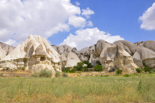 Part of region called Kappadokia in Turkey, you can see these fantastic formations called fairy chimneys. This particular area is near Uchisar in the middle of the street from Nevsehir and Goreme.