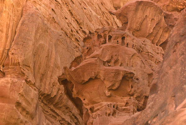 Sandstone rocks shaped and eroded by wind and sand in Wadi Rum desert, Jordan