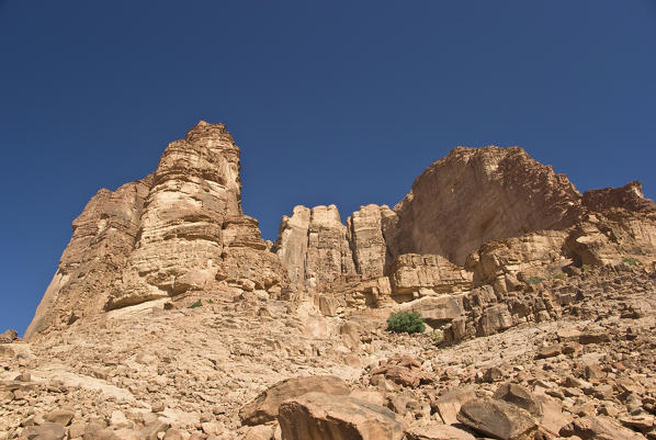 Mountains formed from ancient red granite rocks in the desert of Wadi Rum, Jordan