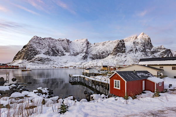Small dock at Reine at sunrise in winter, lofoten islands, nordland, norway, europe