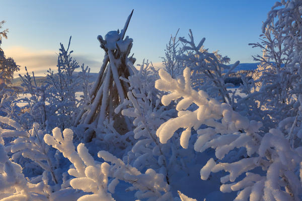 Typical frozen Sami tent near Kilpisjärvi, Lapland, Finland, Europe
