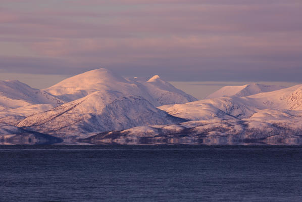 Fata Morgana mirage on a fjord near Tromso with Senja island mountains in background, Tromso, Troms, Norway, Europe
