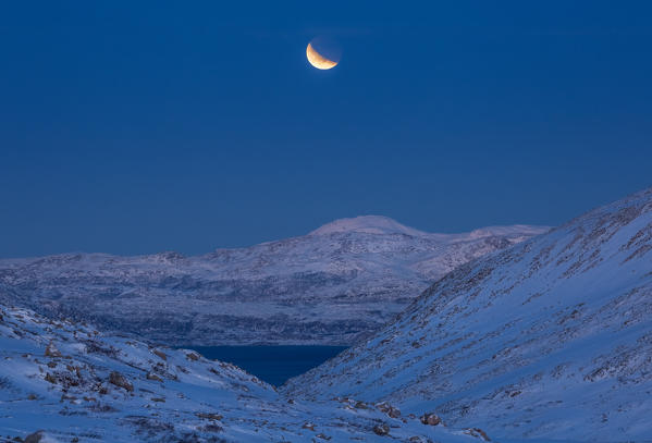 Lunar ecplispe from the slope of mount Brosmetind, Tromvik, Troms, Norway, Europe