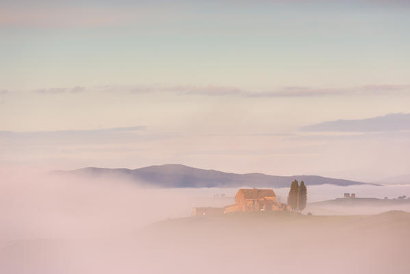 Europe, Italy, Tuscany, Val d'Orcia.
Sunrise in Orcia's valley with fog