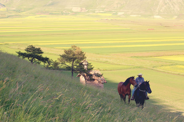 Europe, Italy,Umbria,Perugia district.
Boy riding 