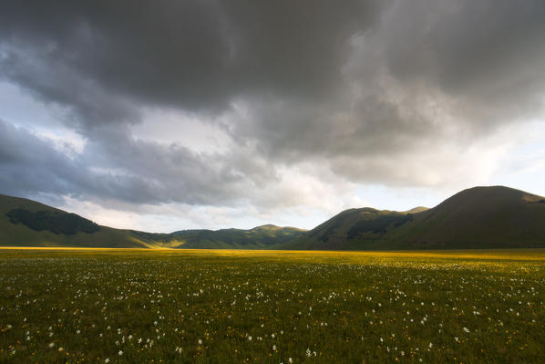 Europe,Italy, Umbria, Perugia district, Sibillini mountains, Castelluccio of Norcia village at sunset 