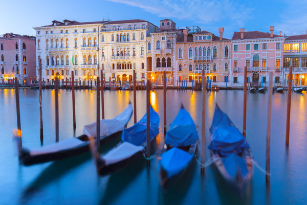 Europe, Italy, Veneto, Venice
Gondolas moored in the Grand Canal at sunset.