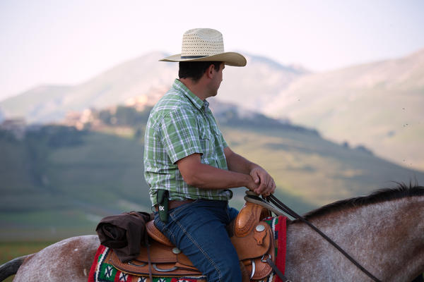 Europe,Italy,Umbria,Perugia district,Castelluccio of Norcia. Horse riding
