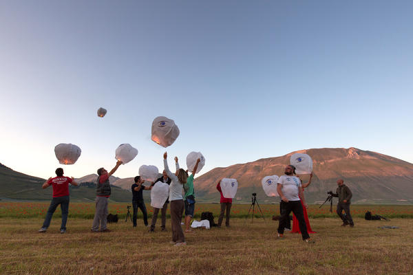 Europe,Italy,Umbria,Perugia district,Castelluccio of Norcia. Chinese Lamps during sunrise