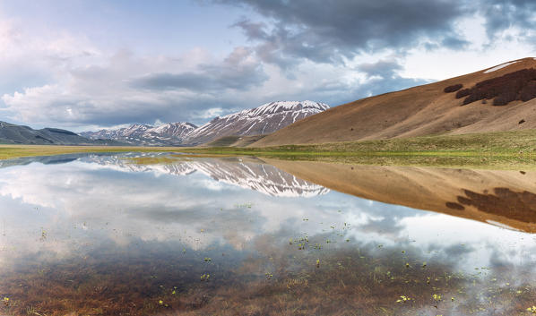 Europe,Italy,Umbria,Perugia district,Castelluccio of Norcia.
Thawing snow 
