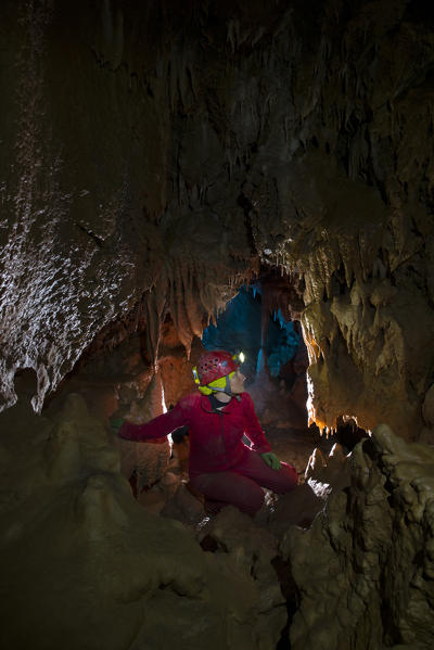 Speleologist in an italian cave