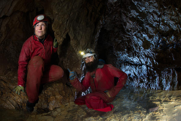 Speleologists in a Ligurian new cave near Genoa