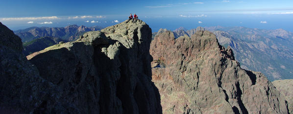 Climbers on the top of Paglia Orba (Corse).