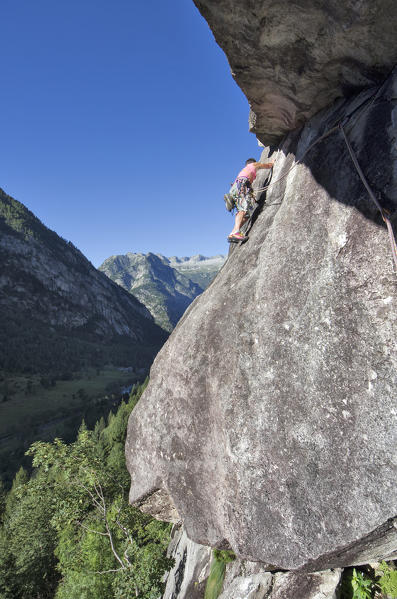 Rock climbing in val di Mello.