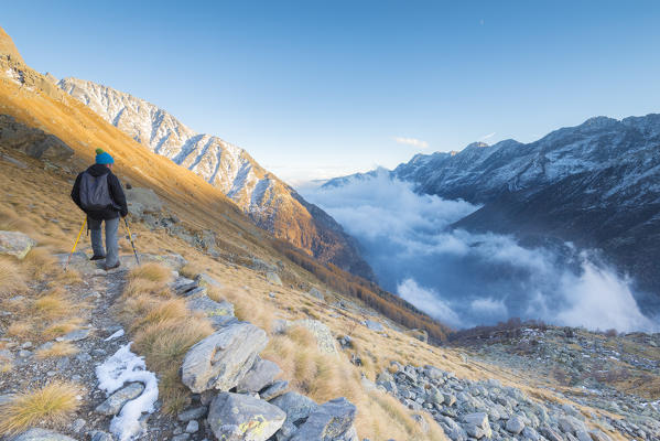 Hiker in Orco valley, Gran Paradiso National Park, Piedmont, province of Turin, Italian alps, Italy