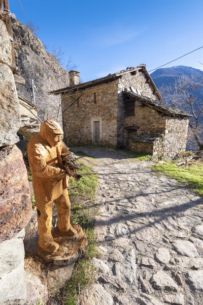 Sculptures in the streets of Chemp, Lys Valley, Aosta Valley, Italian alps, Italy