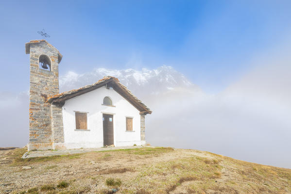 The little church at Serrù lake, Orco Valley, Gran Paradiso National Park, Piedmont, Graian alps, Italian alps, Italy