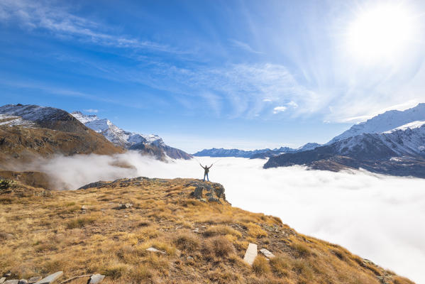 Alpinist in high Orco Valley, Gran Paradiso National Park, Piedmont, Graian alps, Italian alps, Italy
