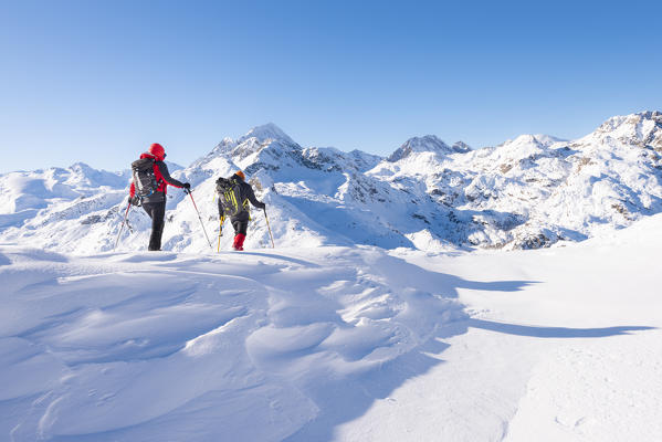 Hikers on Cima Piana, Champorcher valley, Aosta Valley, Italian alps, Italy