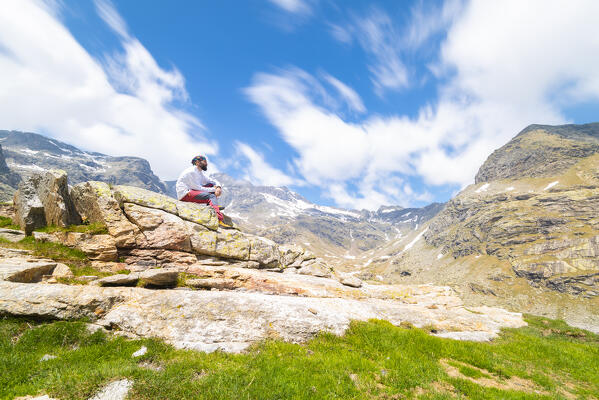 Alpinist in Valle del Drogo, Valle Spluga, province of Sondrio, Lombardy, Italian alps, Italy