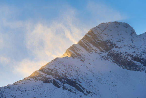 Wind on the east ridge of Torre di Lavina, in the sunset, Campiglia Valley, Valle Soana, Gran Paradiso National Park, Piedmont, Province of Turin, Italian alps, Italy