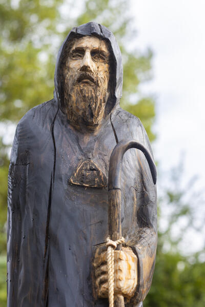 Wooden statue of a pilgrim on Francigena way, Chambave, Aosta Valley, Italian alps, Italy