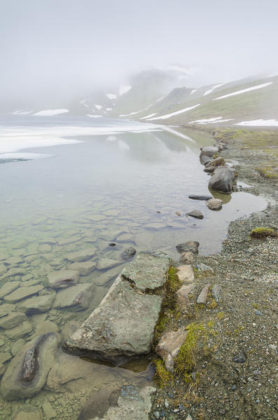 Fog at Rosset lake, Valsavarenche, Gran Paradiso National Park, Aosta Valley, Italian alps, Italy